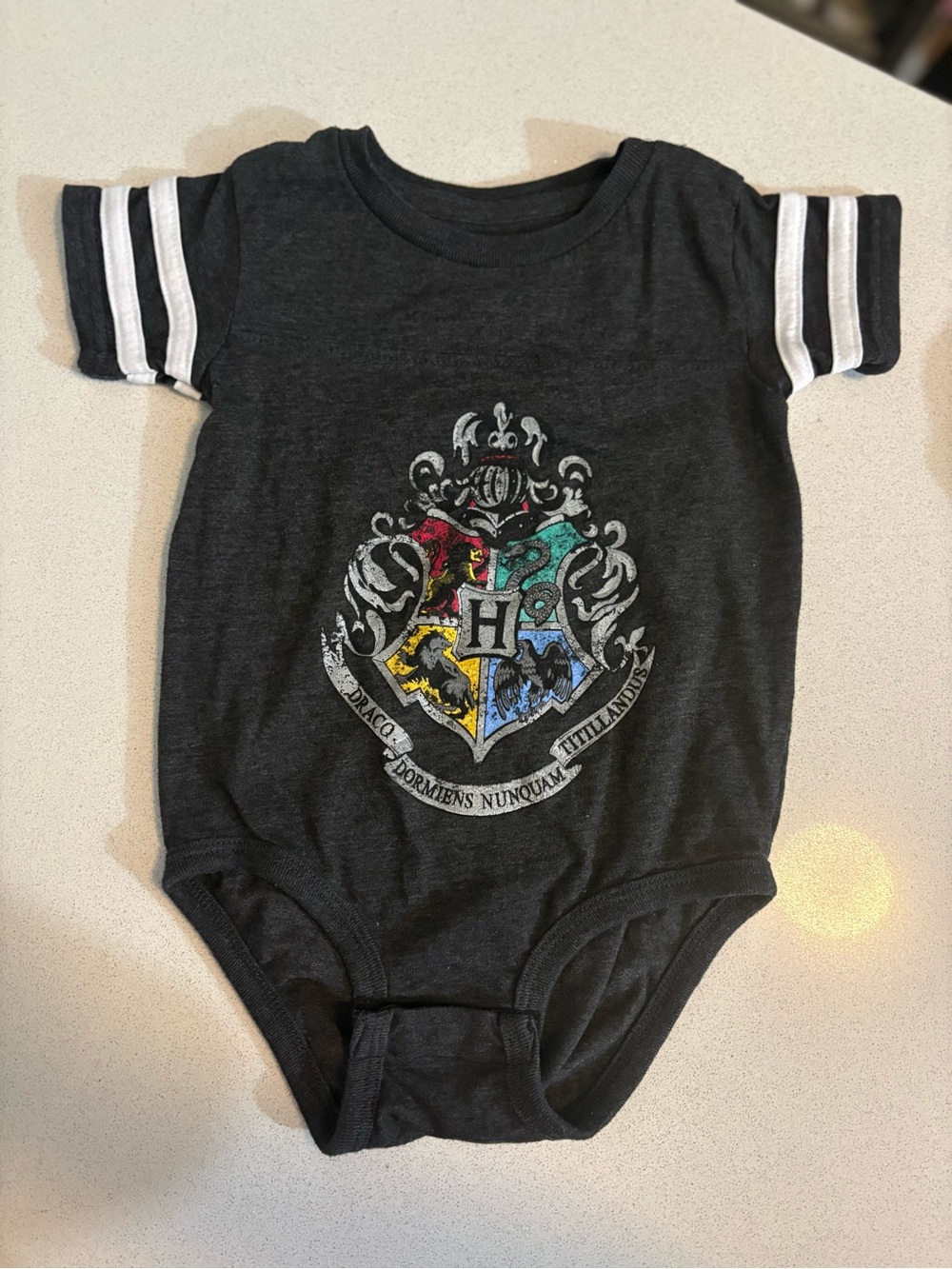 Harry Potter Dark Gray Hogwarts Crest Baby Bodysuit with White Sleeve Stripes